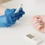 Diabetic patient testing blood