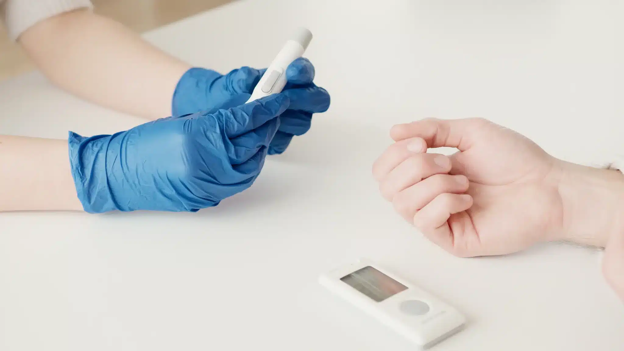 Diabetic patient testing blood