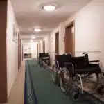 Hospital hallway with wheelchairs for discharge