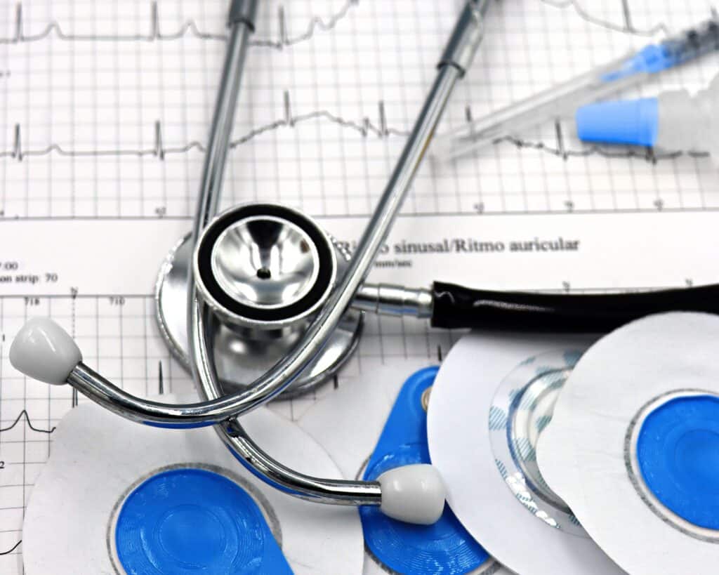 EKG and stethoscope for case study complex medical history