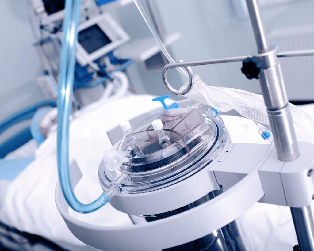 Patient on machine in hospital.
